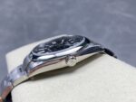 VS Factory Rolex Oyster Perpetual 41mm Bright Black Dial Smooth Bezel Oyster Bracelet (124300) 1:1 Super Clone – DD3230 Movement – Bild 6