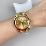 VS Factory Rolex Day-Date 40 Yellow Gold Champagne Baguette Diamond Dial (228238) V2 1:1 Super Clone – DD3255 Movement – Bild 5